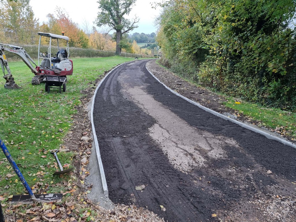 This is a large driveway which is in the process of having a tar and chip driveway installed on by Folkestone Driveways