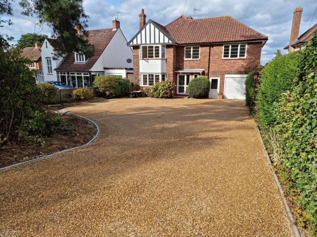 This is a newly installed tar and chip driveway installed by Folkestone Driveways